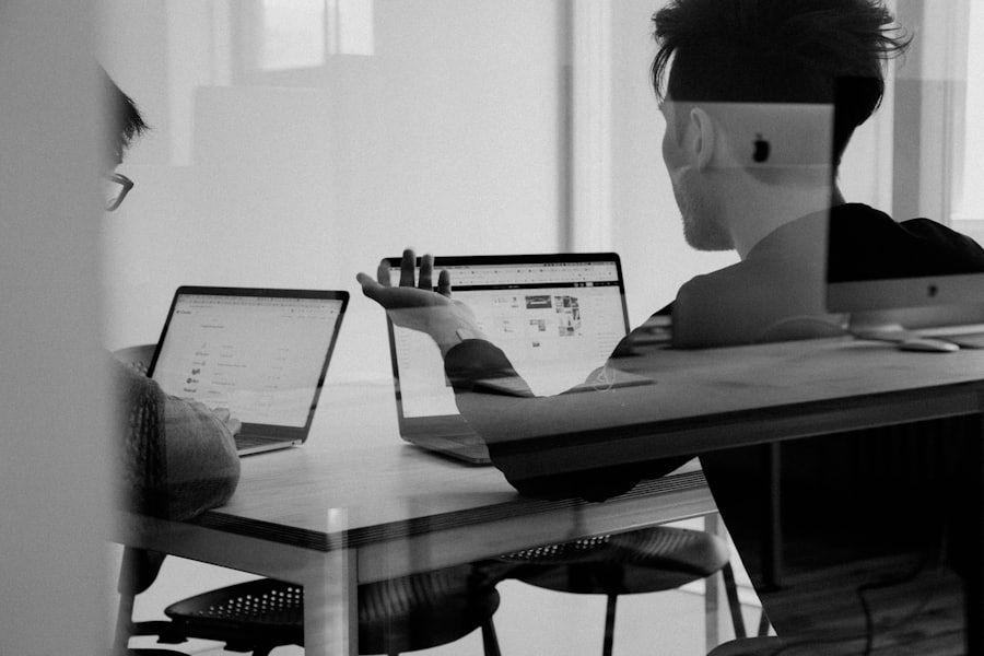 Colleagues collaborating at a desk