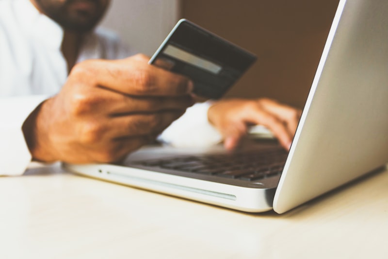 Card payment being made on a laptop