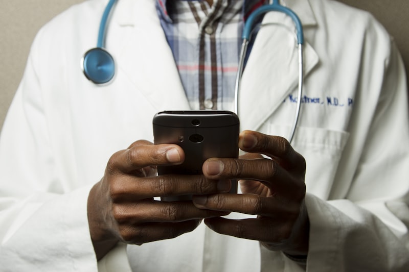 Clinician using a smartphone