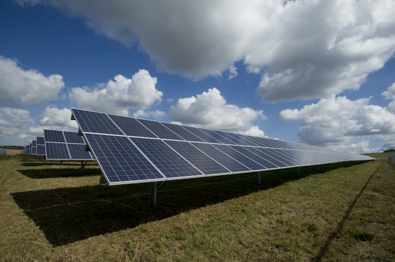 Row of solar panels in a field